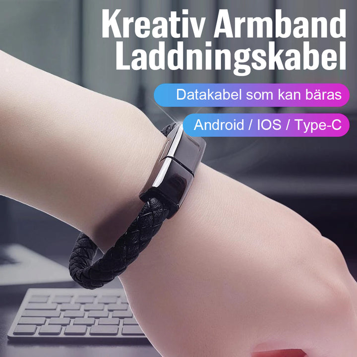 "Elegant armband i svart PU-läder med integrerad laddningskabel, perfekt för modern stil och funktionalitet."