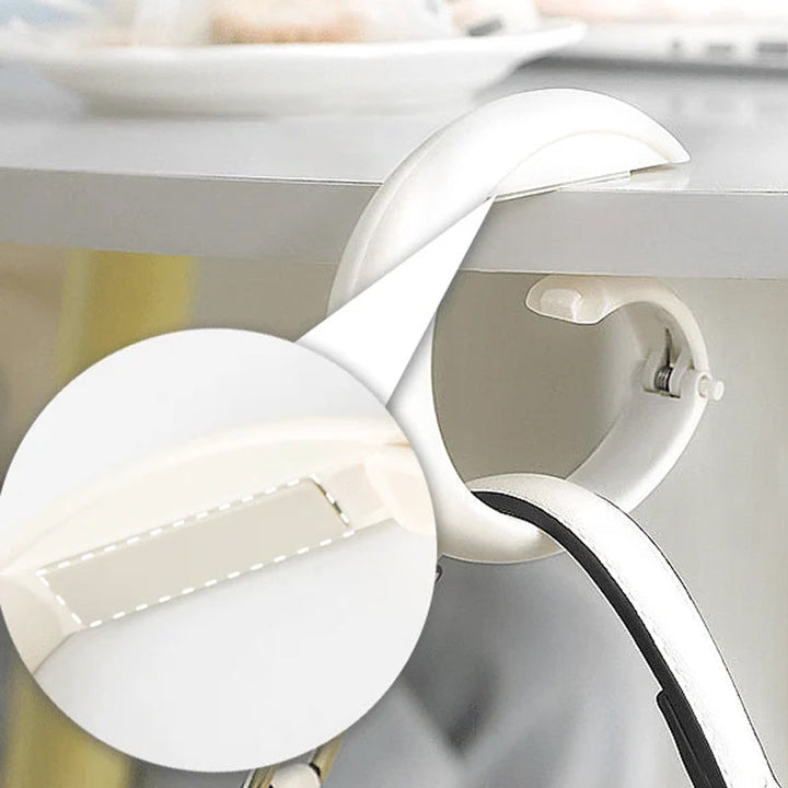 "Elegant bärbar väskkrok för effektiv upphängning, kompakt design, mångsidig användning, perfekt för kaféer."