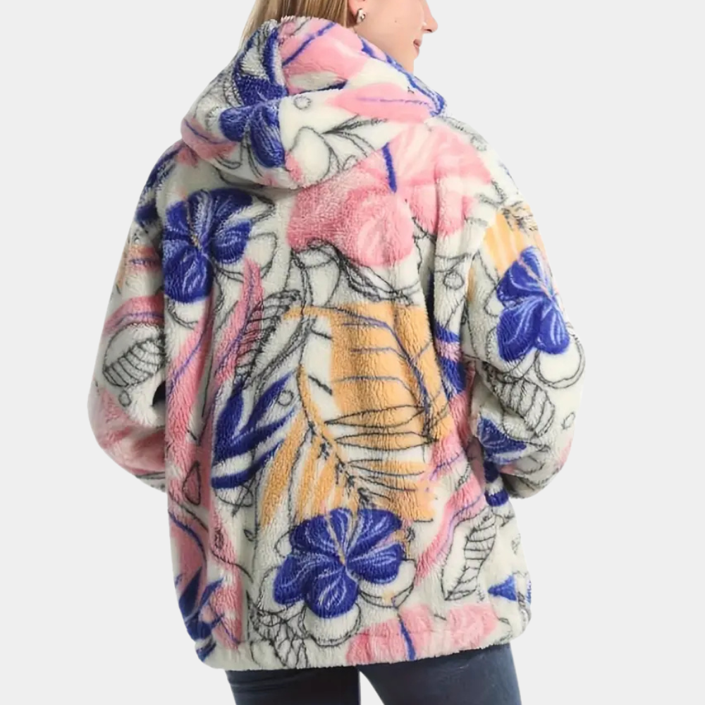 Stilren varm damjacka med elegant blommönster och mysig huva. Idealisk för trendigt kvinnomode under kalla dagar.