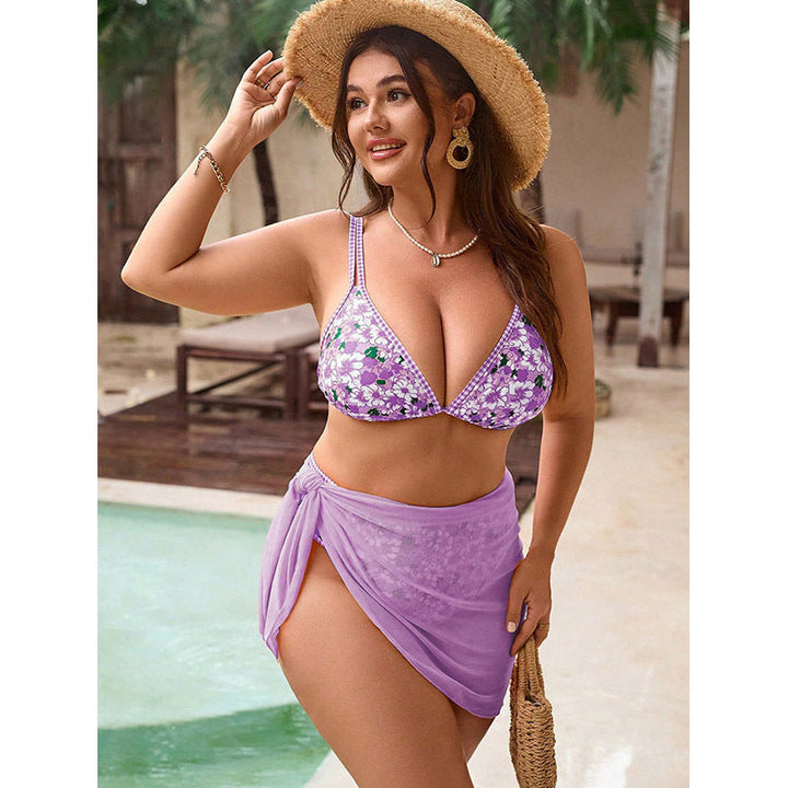 Lätt och elegant sarong med blommönster, perfekt att matcha med bikinins strandmode för damer.