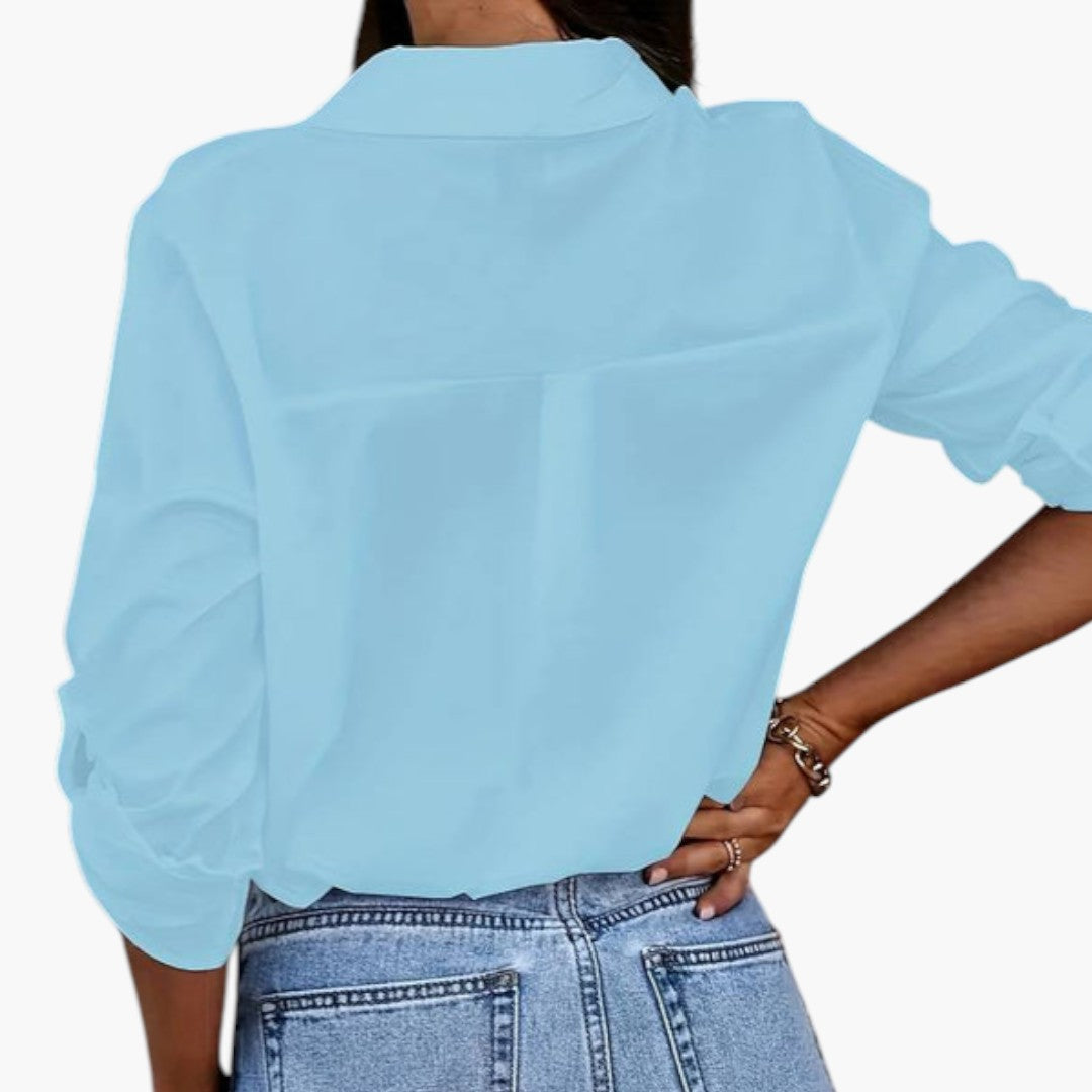 Bekväm dam blus med skjortkrage, knäppning fram och långa ärmar. Elegant och vardagsredo design.