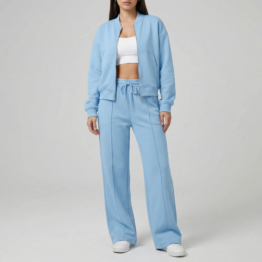 Minimalistiskt dam byxset Evie med raka ben. Stilren & tidlös estetik för en elegant kontors- eller vardagslook.