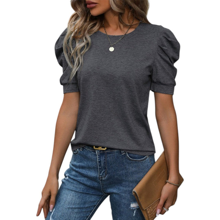 Elegant dam t-shirt med trendiga puffärmar och rund hals, bekväm vardagstopp för kvinnor.