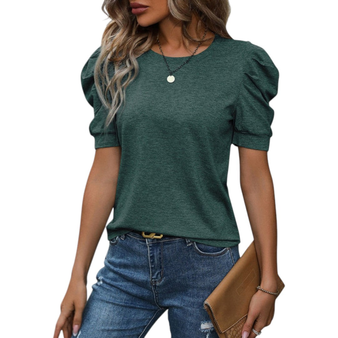 Detaljbild: Elegant dam t-shirt med puffärmar, rund hals och bekvämt material. Perfekt vardagstopp.