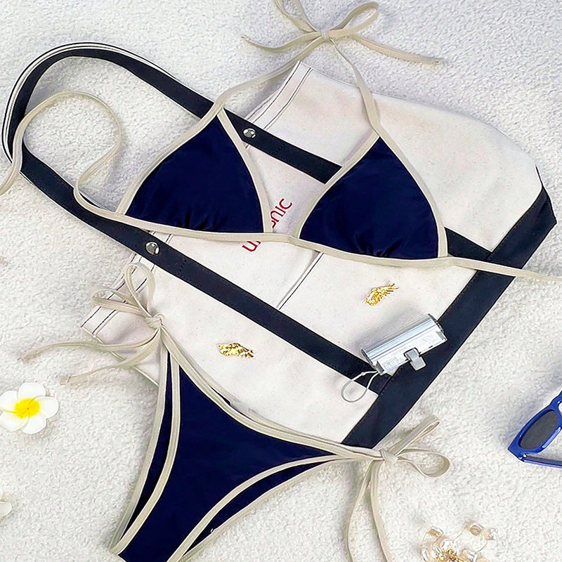 Elegant dam triangelbikini med justerbara axelband, bekväm för stranddagar och bad.