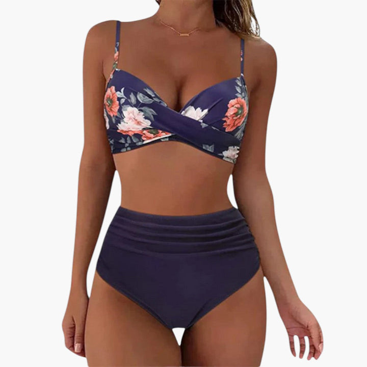 Elegant dambikini med blommönster och justerbar trekantstopp, perfekt för strand och sommar.