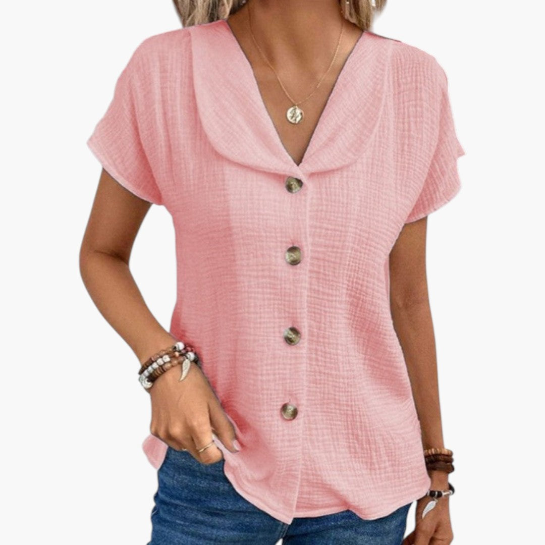 Klassisk damblus med V-ringning & knappar. Elegant kortärmad topp i vit, blå eller rosa för kvinna.