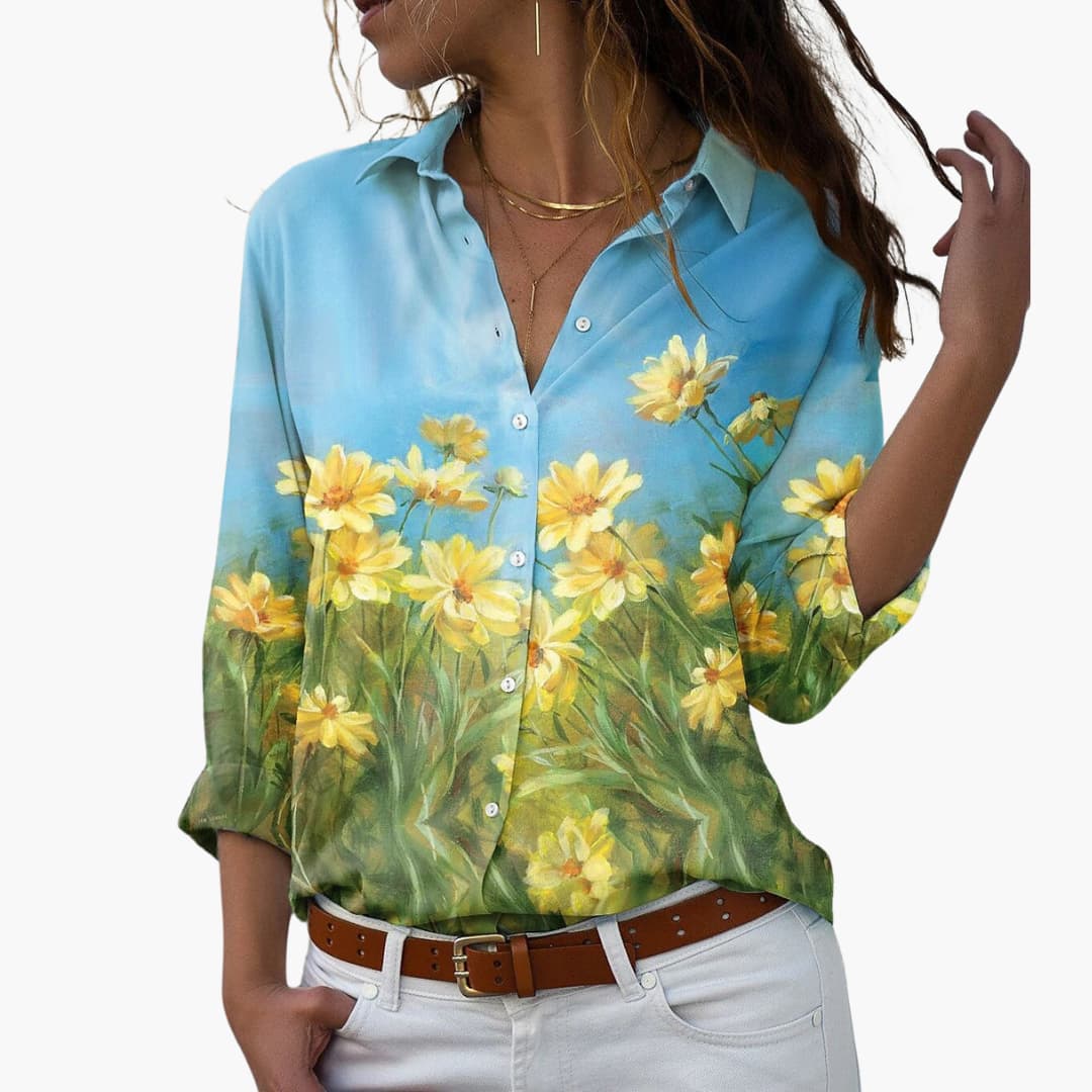 Elegant damblus med blommönster, långa justerbara ärmar. Perfekt för vår och sommar.