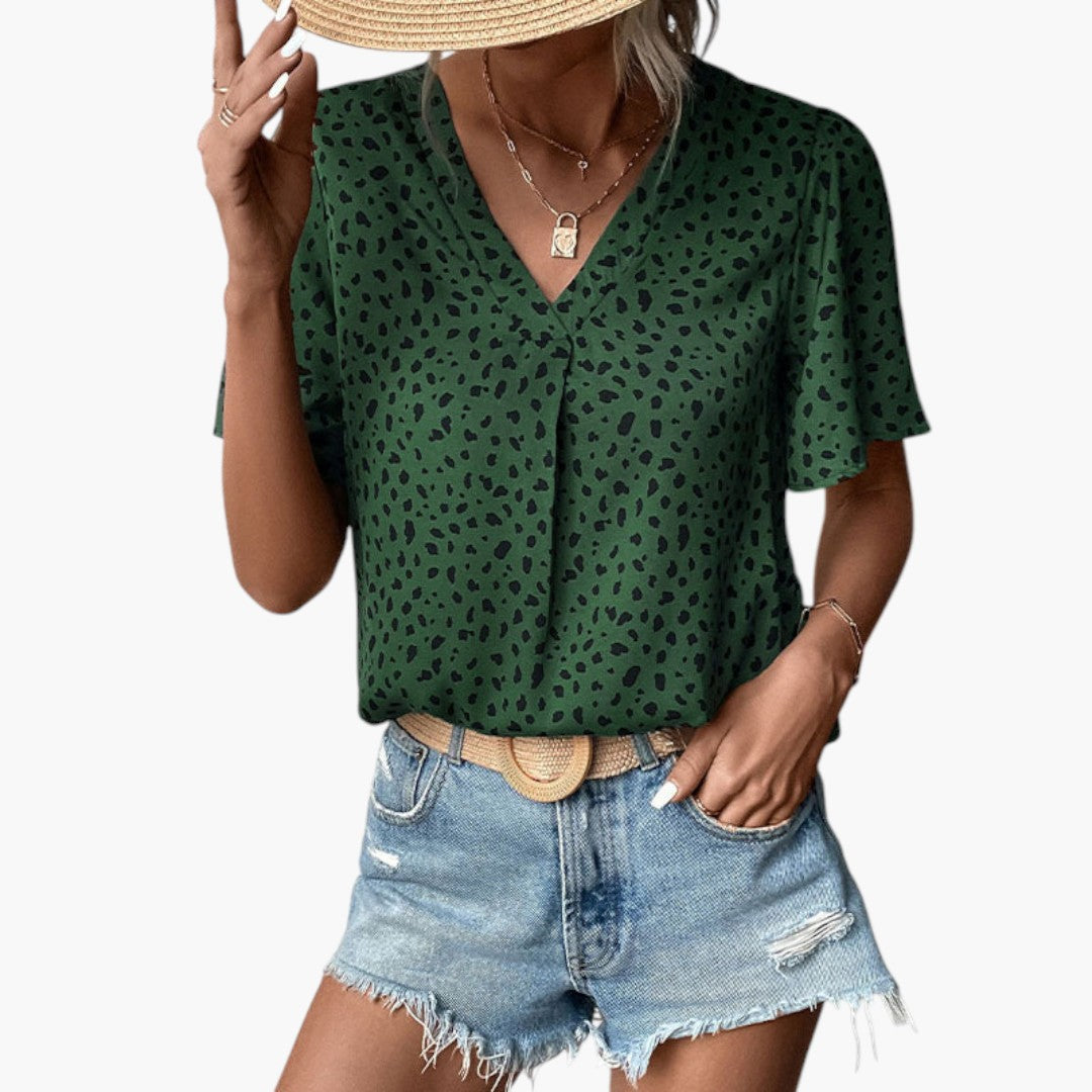 Kortärmad sommarblus med mönstrat tryck och V-ringning, idealisk för varma dagar, casual stil.