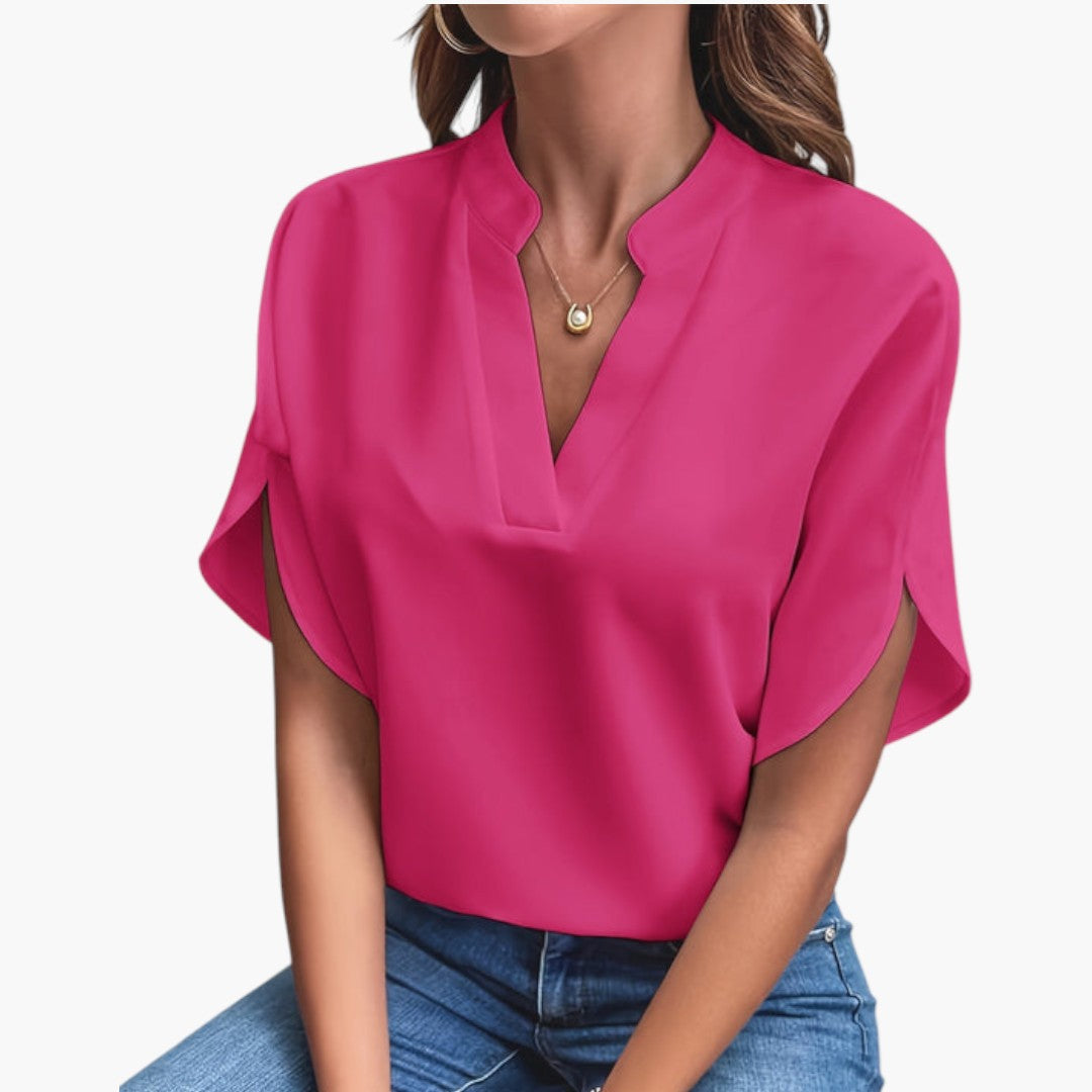 Enfärgad elegant damblus med V-ringning & korta ärmar, en stilren detalj i damgarderoben.