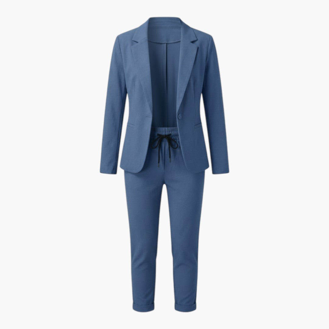 Perfekt damdress-set för kontoret eller festen. Inkluderar stilren kavaj & bekväma byxor för kvinnor.