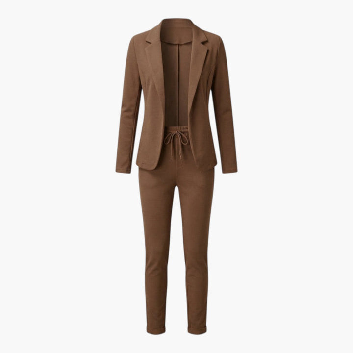 Bekväm & stilren damdress med en elegant kavaj och matchande byxor, perfekt för alla tillfällen.