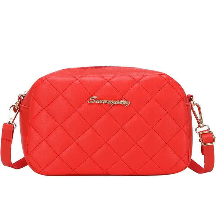 Stilren handväska med snygga metalldetaljer. Elegant accessoar för modeälskare.