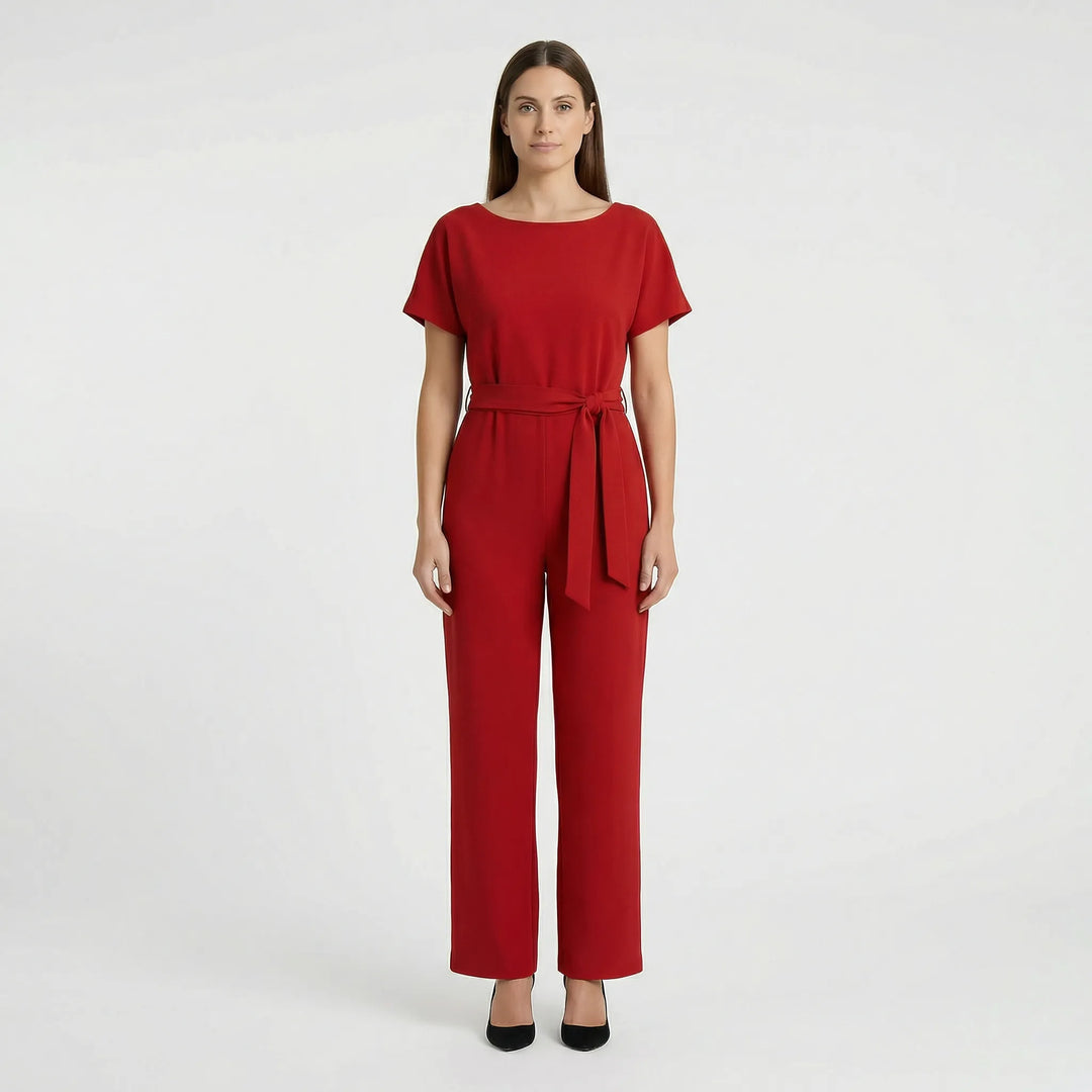 Gör ett statement med denna trendiga damjumpsuit. Vida ben och knytbälte för en elegant helkroppsstil.