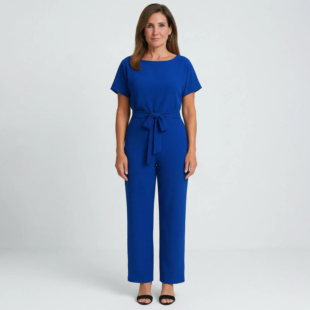 Bekväm och trendig damjumpsuit med vida ben. Minimalistisk design, perfekt för en stilren look.
