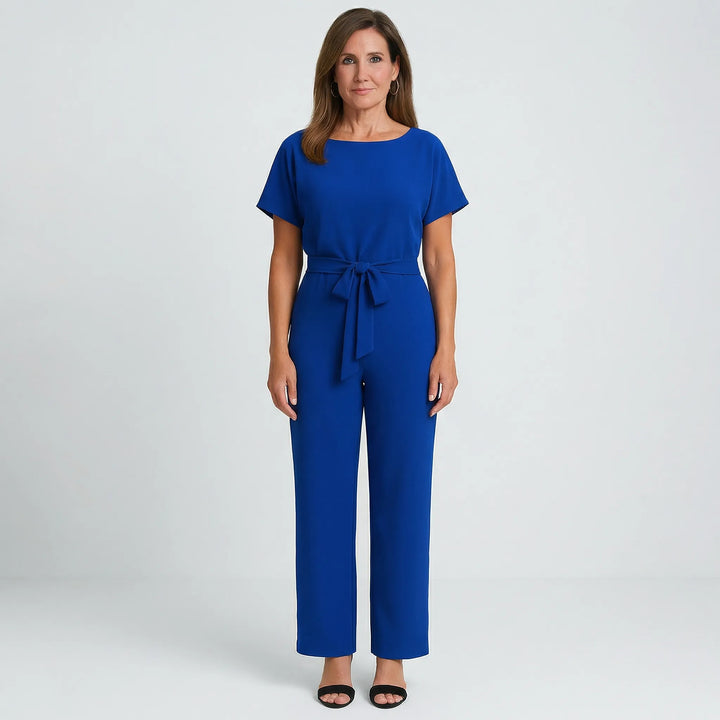 Bekväm och trendig damjumpsuit med vida ben. Minimalistisk design, perfekt för en stilren look.