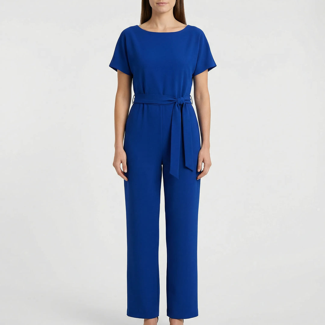 Emma minimalistisk damjumpsuit med vida ben. Bekväm helkroppsstil för en trendig och stilren look.