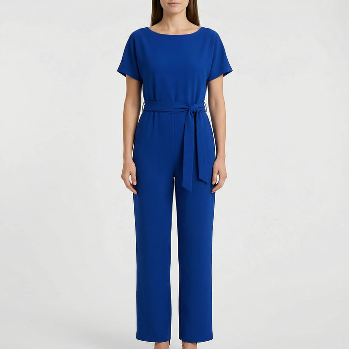 Emma minimalistisk damjumpsuit med vida ben. Bekväm helkroppsstil för en trendig och stilren look.