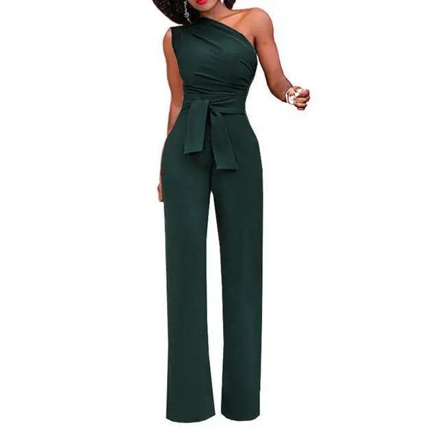 Mångsidig damjumpsuit med en axel i enfärgad design. Elegant, ledig passform, idealisk för sommar och mode.