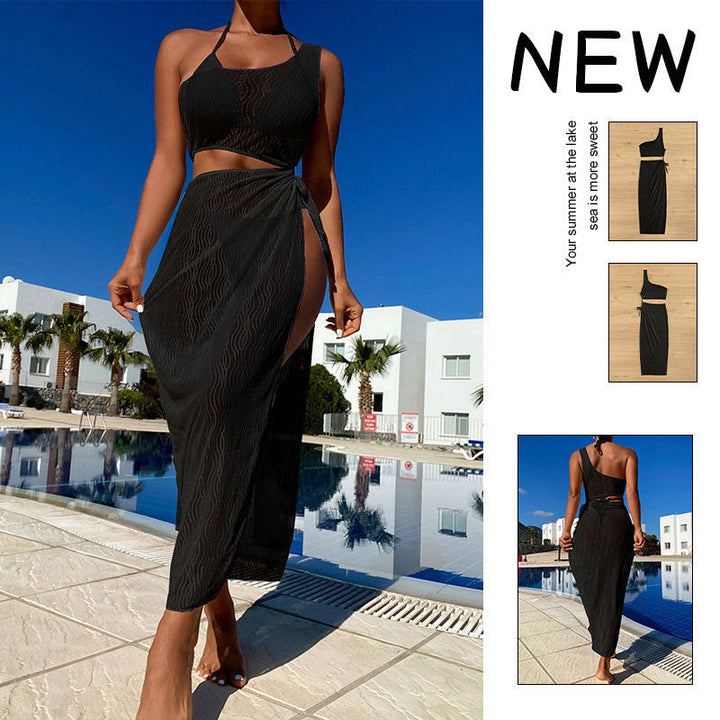 Elegant damknytdress med asymmetrisk topp och elastisk midja, perfekt för sommarfester.