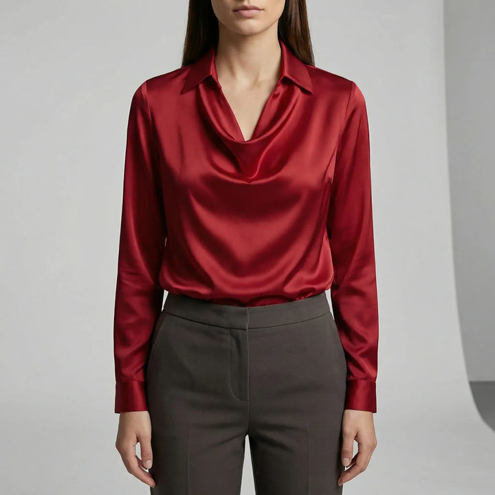 Snygg långärmad draperad blus för dam. En elegant överdel som lyfter din outfit.