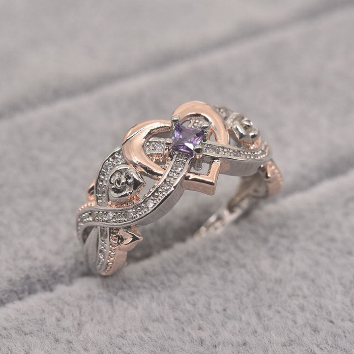 "Elegant februari ametyst ring i silver för kvinnor, handgjord, detaljrik design med hjärta och oändlighetsband."