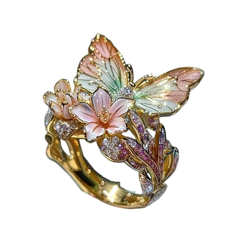 "Elegant fjärilsformad ring i roséguld och silver, justerbar storlek. Smyckad med gnistrande pavé-stenar. Damsmycke."