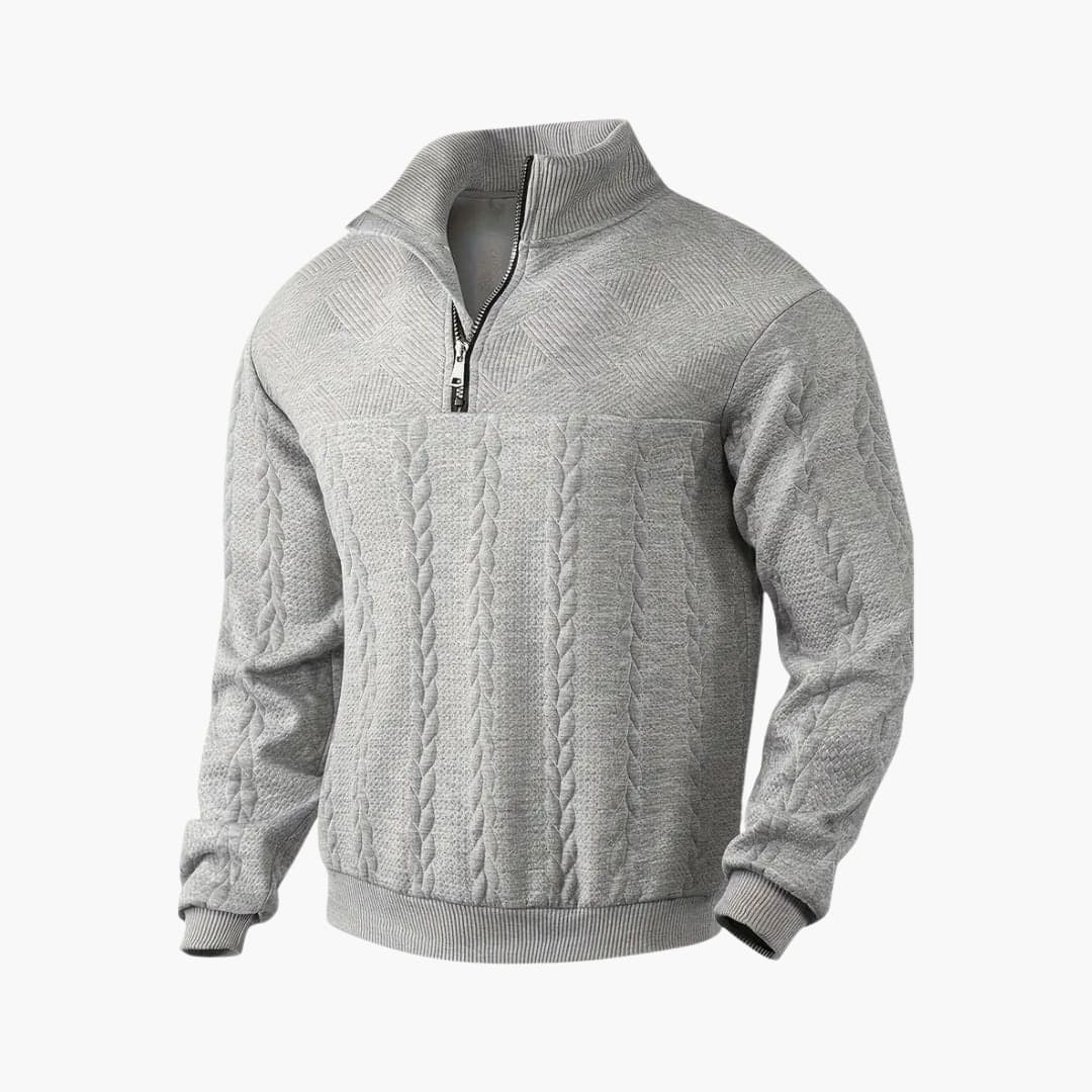 Elegant flätstickad herrtröja med halv dragkedja. Stilren pullover för höst- och vintermode.