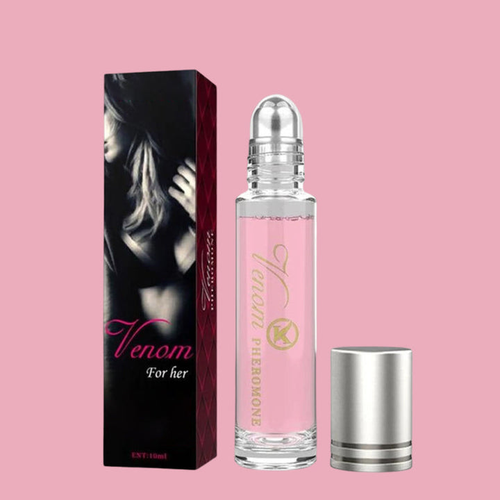 "Elegant flaska med rosa/guld toner, 10ml feromonparfym för män och kvinnor, förstärker naturlig attraktion."