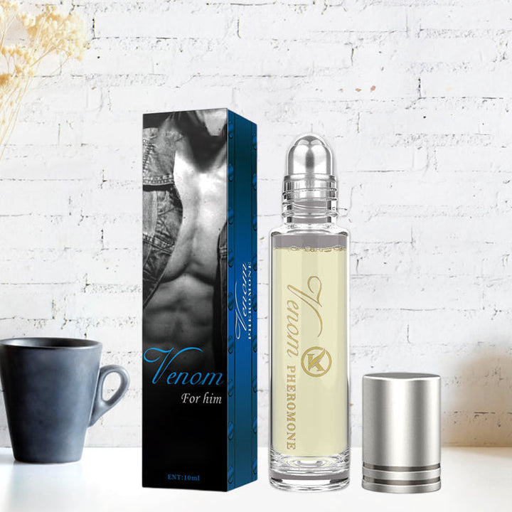"Elegant flaska med rosa/guld toner, 10ml feromonparfym för män och kvinnor, förstärker naturlig attraktion."