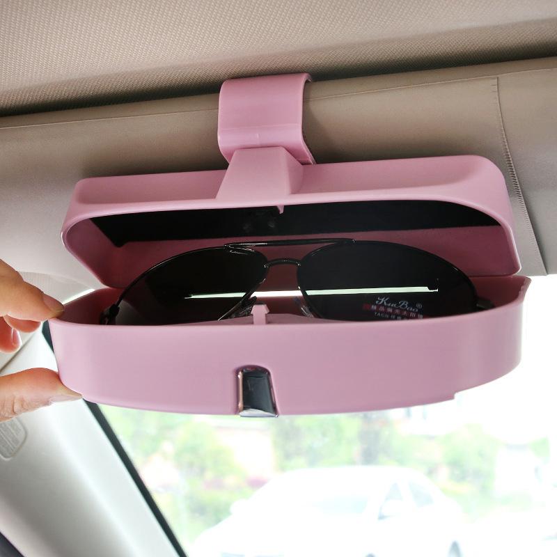"Elegant glasögonhållare för bilsolskydd i rosa, svart, grå och beige, med sammet insida, passar alla glasögon."
