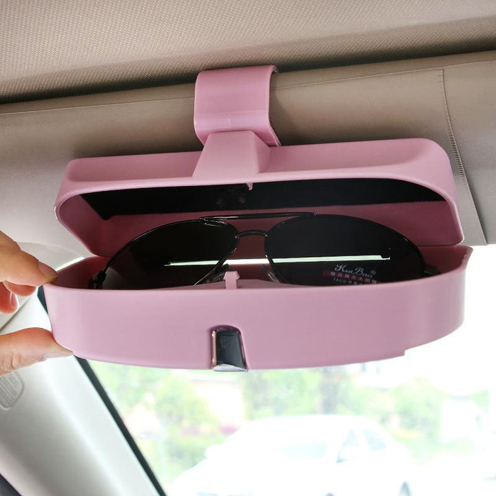 "Elegant glasögonhållare för bilsolskydd i rosa, svart, grå och beige, med sammet insida, passar alla glasögon."