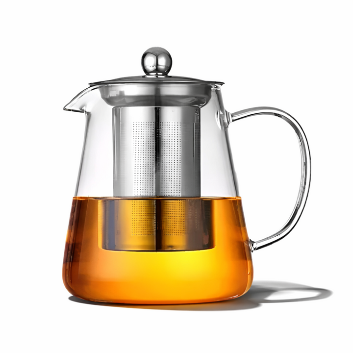 Elegant glastekanna med inbyggd sil för tebryggning hemma. Värmetålig universal tekanna för köket.