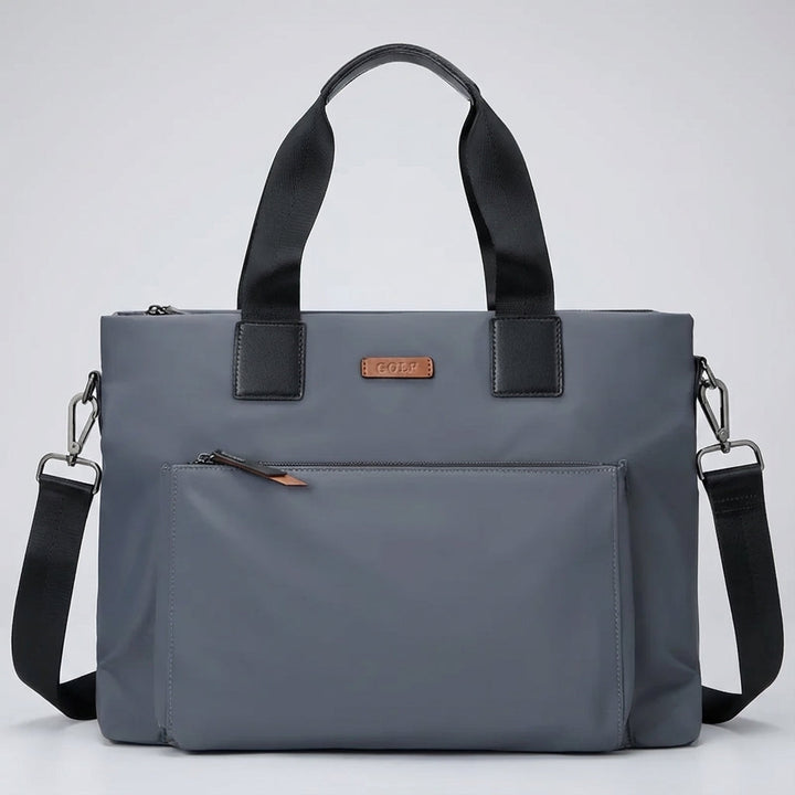 Elegant unisex laptopväska i grå canvas. Mångsidig affärs- och pendlarväska för säker datorförvaring.