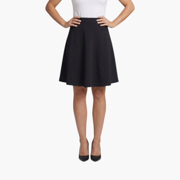 Elegant högmidjad knälång kjol för kvinnor. Perfekt passform för vardag & fest.