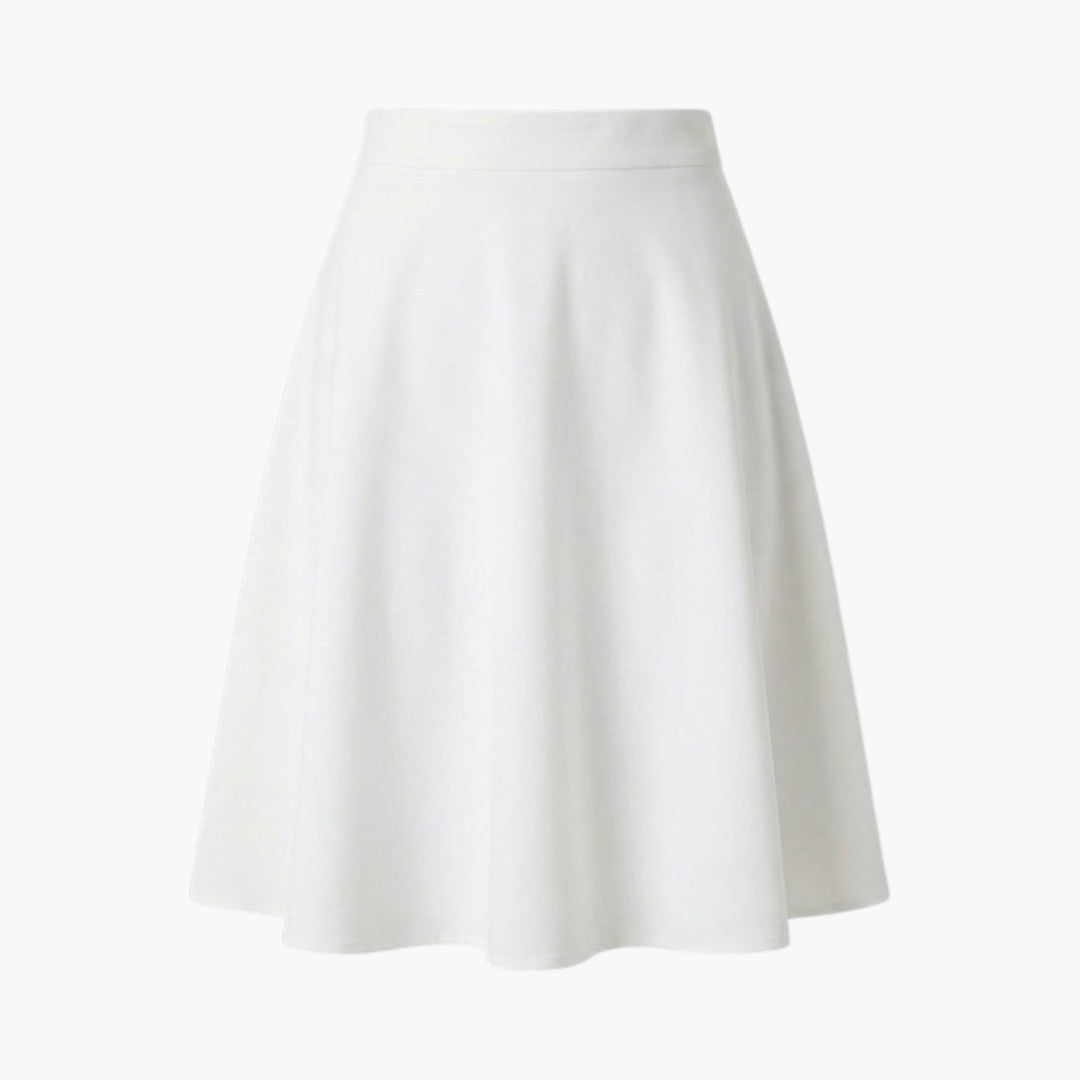 Kvinna bär en elegant, högmidjad, knälång kjol. Perfekt passform för en modern stil.
