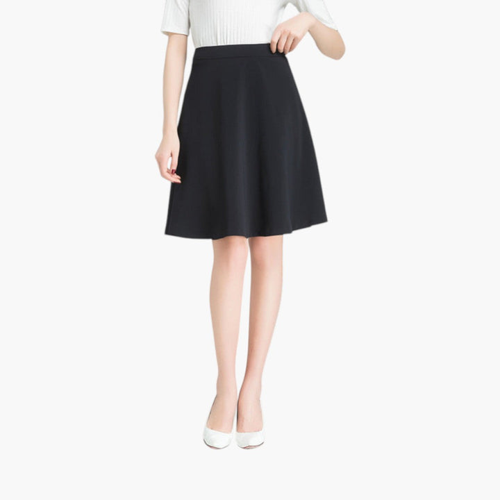 Högmidjad kjol med perfekt passform för kvinnor. Elegant, knälång & bekväm för alla tillfällen.