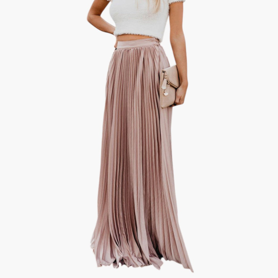 Modeinriktad plisserad långkjol med hög midja, elegant och bekväm. Perfekt som festkjol för sommar.