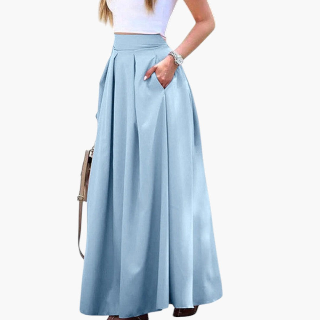 Trendig plisserad högmidjad maxikjol för damer, en elegant kjol med praktiska sidofickor.