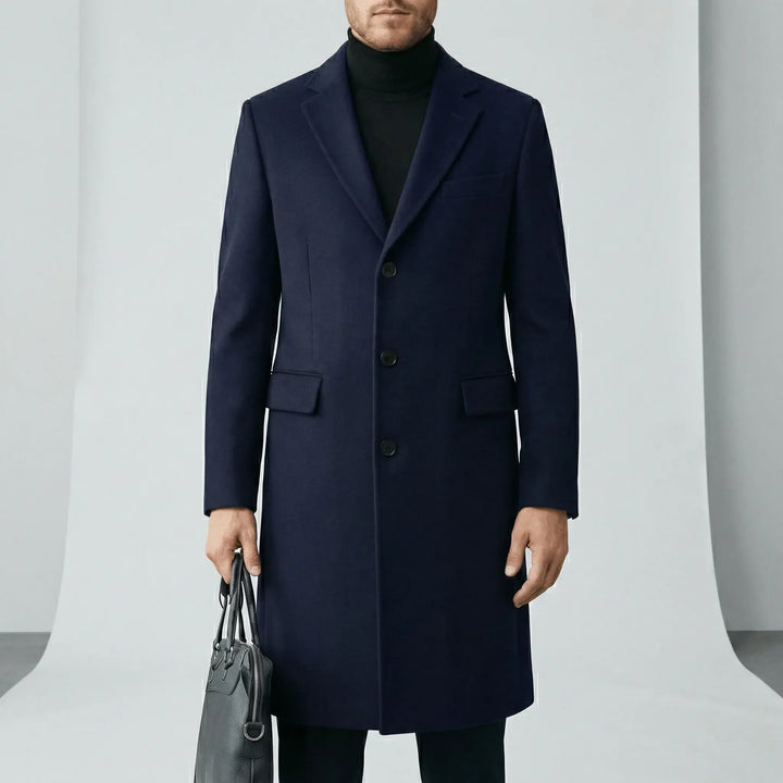 Elegant figursydd vinterkappa Phoenix för herrar, med klassisk knapplist och lång modell.