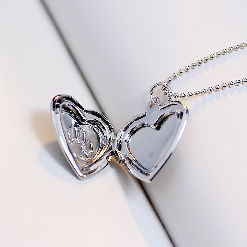 Elegant kvinnors katt tass halsband i silverpläterad alloy med öppningsbart hänge för bild, för stil och djurkärlek.