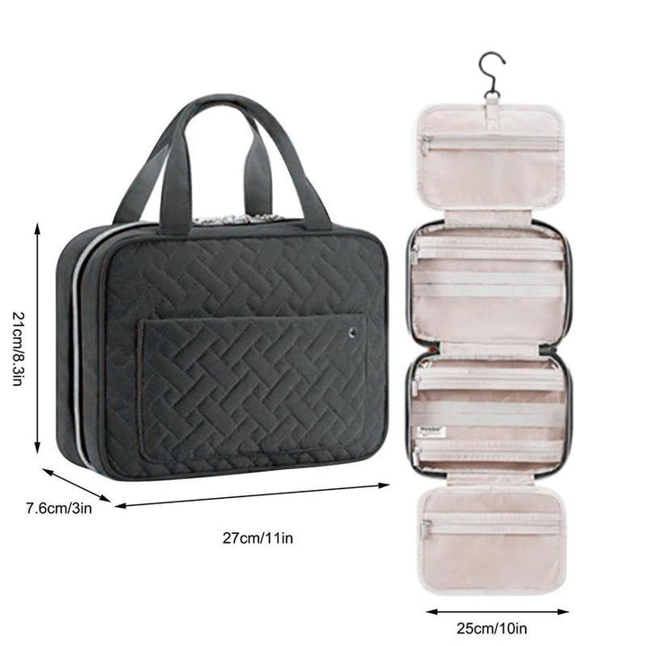 "Elegant kvinnors necessär med 4 fack, hängkrok, mjukt material, svart och rosa färgval, för resor och organisering."