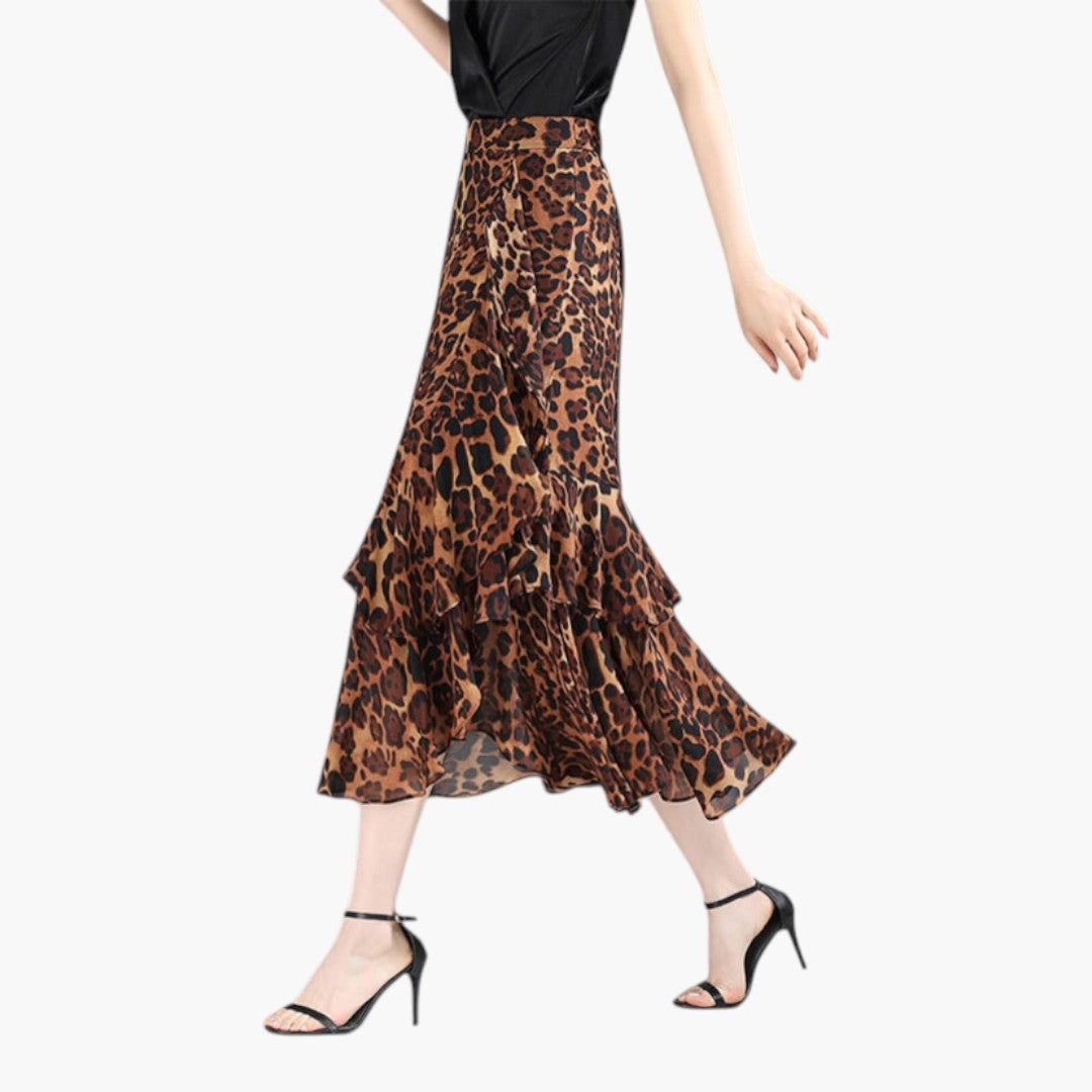Elegant midi-kjol med volanger för dam, hög midja och unikt mönster. Passar till sommar & mode.
