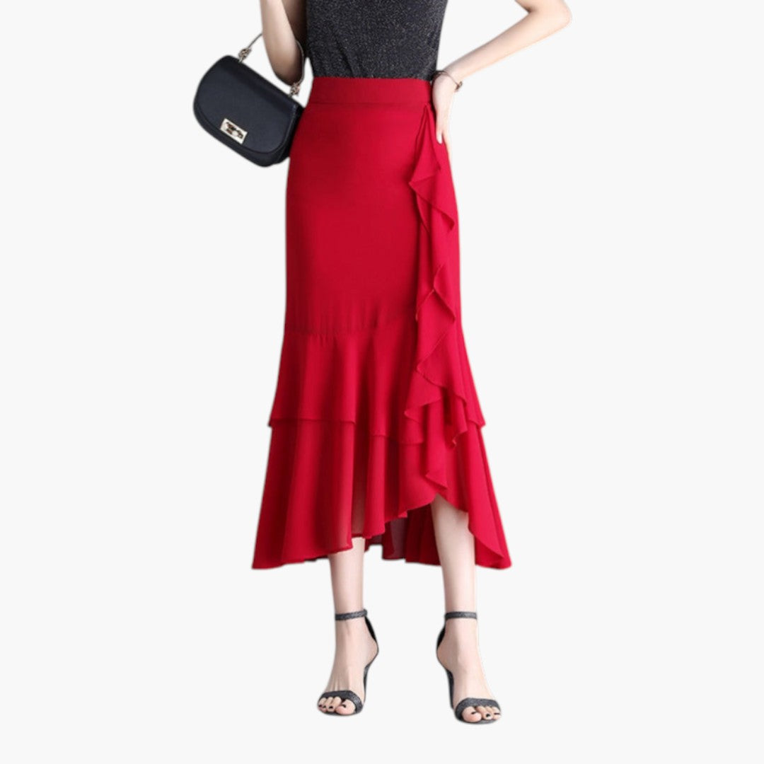Dam midi-kjol, elegant mönstrad, hög midja och vackra volanger. Perfekt för sommar och mode.