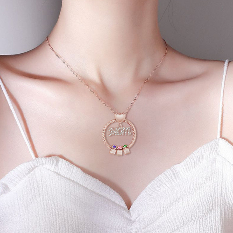 Elegant mammas halsband med födelsesten i guld, intrikat hjärtdesign och tvinnad repdetalj för kvinnor.