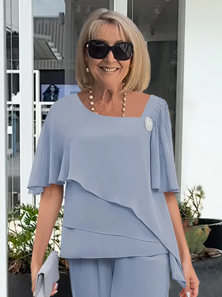 Bekvämt och elegant dam tvådelat sommarset med modern topp & byxor, perfekt för bröllopsgäst eller fest.