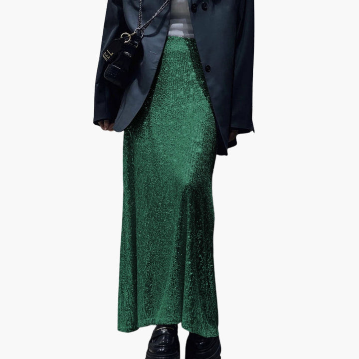 Aftonkjol med paljetter för festliga tillfällen. Elegant maxikjol med hög midja och glitter.
