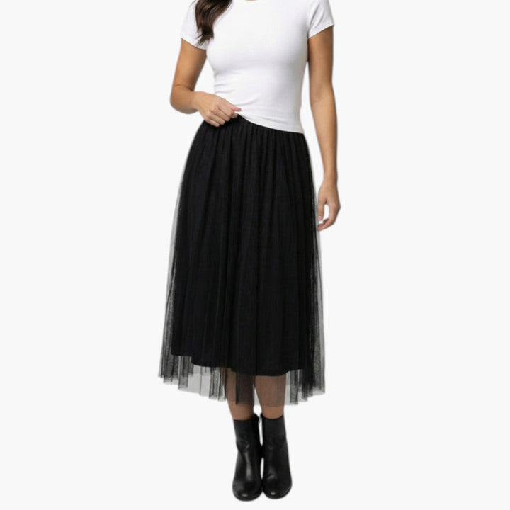 Elegant midikjol i tyll med bekväm elastisk midja. Stilren damkjol, perfekt för fest & vardag.
