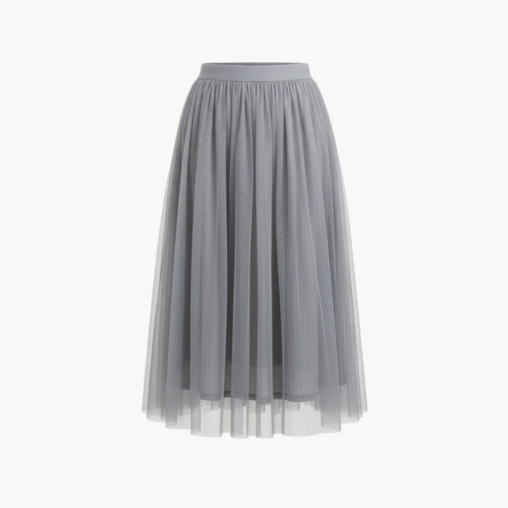 Elegant tyllkjol, midikjol med elastisk midja. En klassisk damkjol för alla tillfällen.