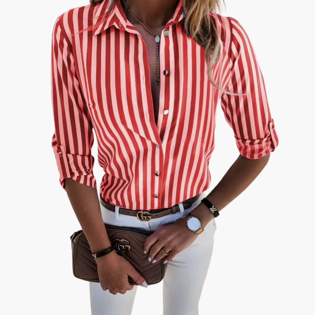Mångsidig långärmad randig blus för dam. Med knäppning, perfekt för både stil och komfort.